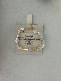 A keshi pearl bracelet with gold plating and high quality solid sterling silver, displayed on a card with the text 'FRENCH PARIS' and 'I NOT THE DEAD LOVE SPRING'.