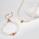 POPPY Pearl and Flower Pendant Necklace and Bracelet
