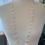 Necklace with keshi pearl on a mannequin against a neutral background
