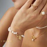 ADELE Pearl friendship bracelet with charm - ZEN&CO Studio