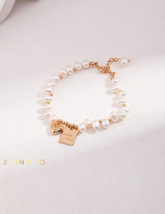 ADELE Pearl friendship bracelet with charm - ZEN&CO Studio