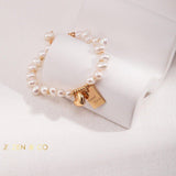 ADELE Pearl friendship bracelet with charm - ZEN&CO Studio