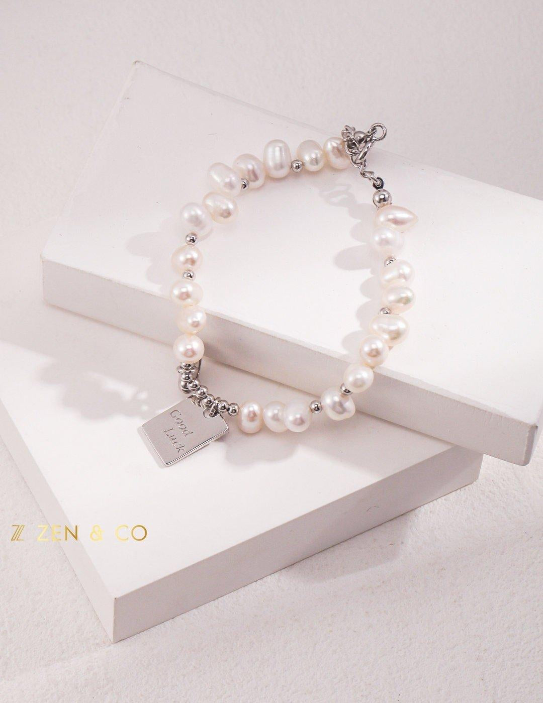 ADELE Pearl friendship bracelet with charm - ZEN&CO Studio