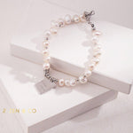 ADELE Pearl friendship bracelet with charm - ZEN&CO Studio