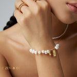 ADELE Pearl friendship bracelet with charm - ZEN&CO Studio