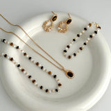 KAMALA Tiny beaded tiger eye stone and mother of pearl necklace and bracelet - ZEN&CO Studio