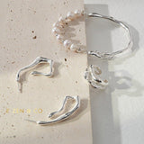 ZOEY Fluid Way of Water open hoop earrings - ZEN&CO Studio