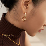 ZOEY Fluid Way of Water open hoop earrings - ZEN&CO Studio